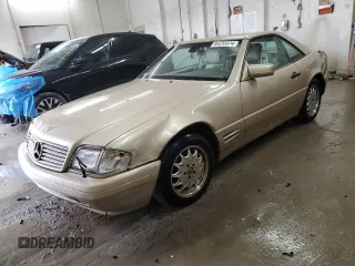 1997 Mercedes-Benz SL-Class with VIN WDBFA67F5VF147986, listed as a Copart auction lot 84255574 with 158,607 mi miles and Salvage Title. Bid and sale history available at carsss.com. Image 1.