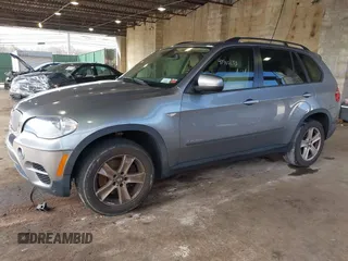 2012 BMW X5 35d with VIN 5UXZW0C59CL673416, listed as a IAAI auction lot 41910233 with 70,008 mi miles and . Bid and sale history available at DreamBid. Image 2.