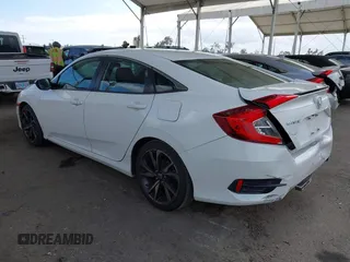 2019 Honda Civic Sedan Sport with VIN 2HGFC2F85KH539451, listed as a IAAI auction lot 42047385 with 312,478 mi miles. Bid and sale history available at carsss.com. Image 3.