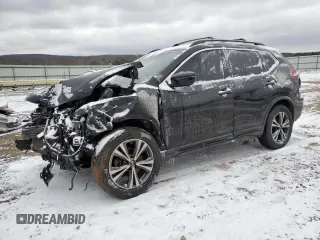 2017 Nissan Rogue SL z VIN 5N1AT2MV9HC798355, wystawiony jako Copart lot #46107415 z przebiegiem 101 683 mil mil oraz Szkoda całkowita • Salvage title. Historia ofert i sprzedaży dostępna na DreamBid. Obrazek 1.