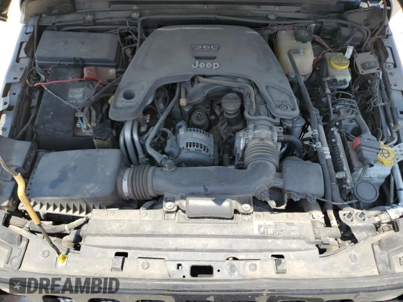 2020 Jeep Wrangler Sport with VIN 1C4GJXAGXLW237080, listed as a Copart auction lot 57769704 with 144,137 mi miles and Salvage title. Bid and sale history available at DreamBid. Image 11.