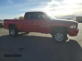 2001 Dodge 1500 with VIN 3B7HF13Z51G250557, listed as a Copart auction lot 85394394 with 216,400 mi miles and Salvage Title. Bid and sale history available at DreamBid. Image 4.