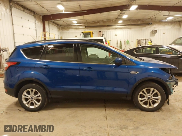 2018 Ford Escape SE with VIN 1FMCU9GD4JUA83470, listed as a IAAI auction lot 41272882 with 105,661 mi miles. Bid and sale history available at carsss.com. Image 13.