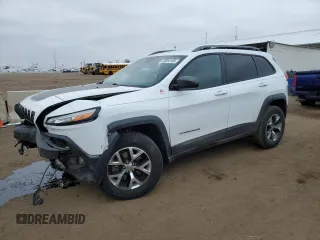 2016 Jeep Cherokee Trailhawk with VIN 1C4PJMBB7GW326449, listed as a Copart auction lot 45004165 with 87,668 mi miles and Salvage Title. Bid and sale history available at carsss.com. Image 1.
