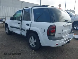 2005 Chevrolet TrailBlazer LS with VIN 1GNDS13SX52388713, listed as a IAAI auction lot 42100834 with 153,824 mi miles and . Bid and sale history available at DreamBid. Image 3.