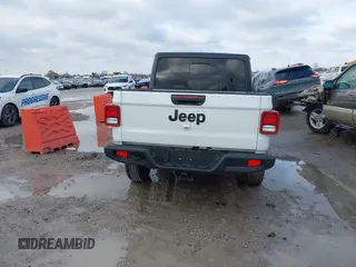 2022 Jeep Gladiator Texas Trail z VIN 1C6HJTAG8NL152487, wystawiony jako IAAI lot #41053737 z przebiegiem 49 411 mil mil oraz . Historia ofert i sprzedaży dostępna na DreamBid. Obrazek 17.