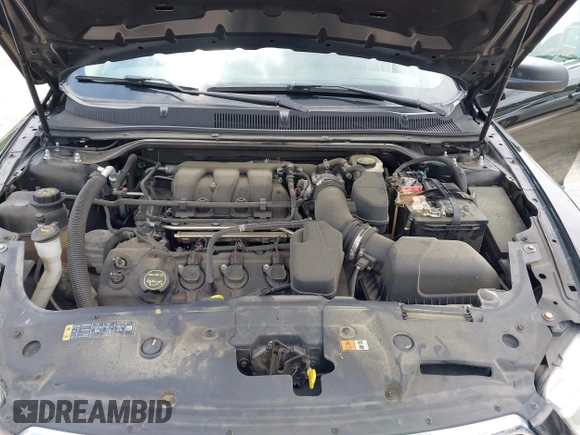 2014 Ford Taurus SE z VIN 1FAHP2D81EG140072, wystawiony jako IAAI lot #42124900 z przebiegiem 116 560 mil mil oraz . Historia ofert i sprzedaży dostępna na DreamBid. Obrazek 10.