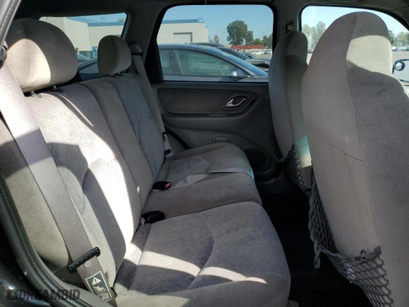 2001 Mazda Tribute LX with VIN 4F2YU09151KM38909, listed as a Copart auction lot 77808264 with 136,005 mi miles and Salvage Title. Bid and sale history available at carsss.com. Image 11.