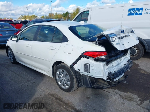 2023 Toyota Corolla Hybrid LE with VIN JTDBCMFEXP3017214, listed as a IAAI auction lot 40590468 with 9,428 mi miles and . Bid and sale history available at carsss.com. Image 3.