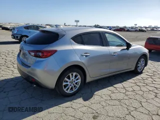 2015 Mazda 3 i Grand Touring z VIN JM1BM1M70F1260802, wystawiony jako Copart lot #60662705 z przebiegiem 89 974 mil mil oraz Szkoda całkowita • Salvage title. Historia ofert i sprzedaży dostępna na DreamBid. Obrazek 3.