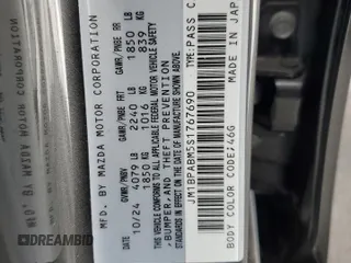 2025 Mazda 3 S Select Sport with VIN JM1BPABM5S1767690, listed as a Copart auction lot 52829045 with 1,093 mi miles and Salvage Title. Bid and sale history available at DreamBid. Image 12.