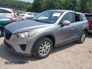 2014 Mazda CX-5 Sport with VIN JM3KE4BE9E0411177, listed as a IAAI auction lot 42411938 with 167,709 mi miles and . Bid and sale history available at DreamBid. Image 17.