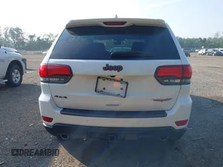 2017 Jeep Grand Cherokee Trailhawk with VIN 1C4RJFLG2HC670868, listed as a IAAI auction lot 42711041 with 129,465 mi miles and . Bid and sale history available at DreamBid. Image 16.