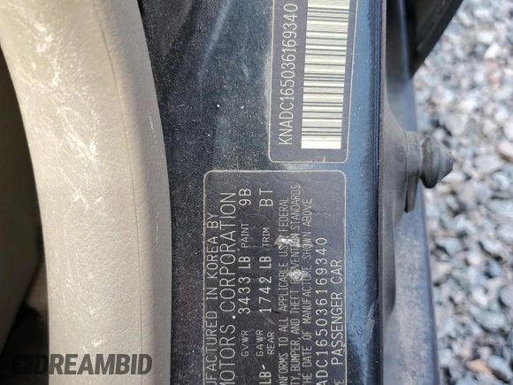 2003 Kia Rio with VIN KNADC165036169340, listed as a Copart auction lot 51538975 with 136,054 mi miles and Salvage Title. Bid and sale history available at carsss.com. Image 14.