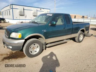 2000 Ford F-150 XL z VIN 1FTRX18L5YNB71025, wystawiony jako Copart lot #54582405 z przebiegiem 98 058 mil mil oraz Szkoda całkowita • Salvage title. Historia ofert i sprzedaży dostępna na DreamBid. Obrazek 1.
