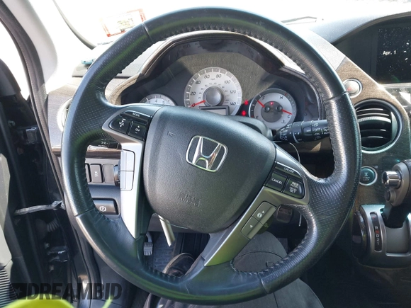 2014 Honda Pilot Touring with VIN 5FNYF4H94EB049495, listed as a IAAI auction lot 41937134 with 149,445 mi miles and . Bid and sale history available at carsss.com. Image 12.