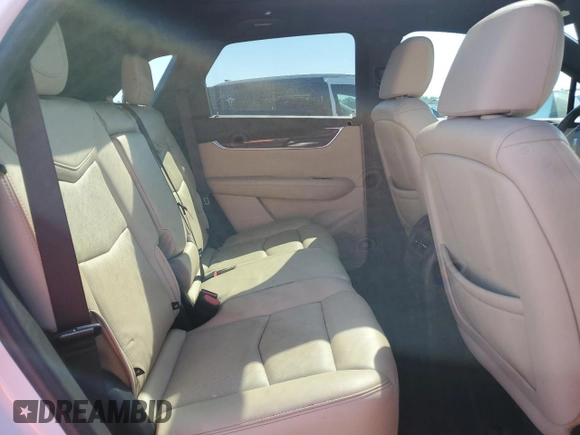 2019 Cadillac XT5 Luxury FWD z VIN 1GYKNCRS6KZ271427, wystawiony jako Copart lot #58873725 z przebiegiem Nie podano mil oraz Szkoda całkowita • Salvage title. Historia ofert i sprzedaży dostępna na DreamBid. Obrazek 11.