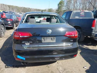 2017 Volkswagen Jetta SEL z VIN 3VWL17AJ5HM246543, wystawiony jako IAAI lot #41650614 z przebiegiem 112 168 mil mil oraz . Historia ofert i sprzedaży dostępna na DreamBid. Obrazek 16.