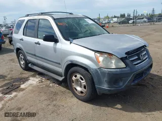 2005 Honda CR-V LX with VIN JHLRD68565C015724, listed as a IAAI auction lot 42021737 with 207,142 mi miles. Bid and sale history available at carsss.com. Image 1.