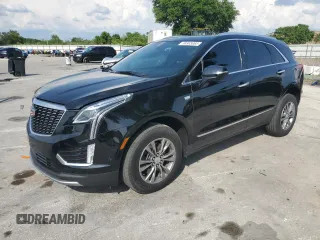 2022 Cadillac XT5 FWD Premium Luxury z VIN 1GYKNCRS7NZ101131, wystawiony jako Copart lot #56365065 z przebiegiem 74 168 mil mil oraz Szkoda całkowita • Salvage title. Historia ofert i sprzedaży dostępna na DreamBid. Obrazek 1.