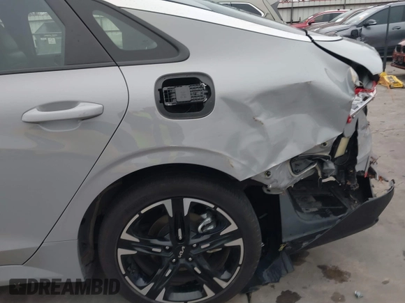 2024 Kia K5 GT-Line z VIN 5XXG64J29RG237148, wystawiony jako IAAI lot #41396574 z przebiegiem 22 926 mil mil oraz . Historia ofert i sprzedaży dostępna na DreamBid. Obrazek 12.
