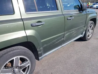 2009 Jeep Patriot Sport with VIN 1J4FT28B99D139661, listed as a IAAI auction lot 41644514 with 155,117 mi miles and . Bid and sale history available at DreamBid. Image 12.