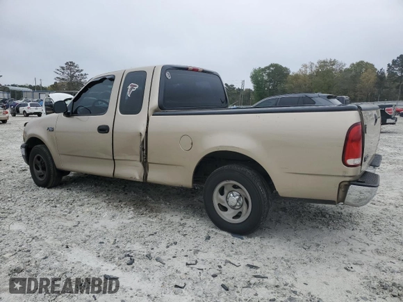 1999 Ford F-150 with VIN 1FTZX1721XNA37541, listed as a Copart auction lot 51588415 with 267,071 mi miles and Salvage title. Bid and sale history available at DreamBid. Image 2.