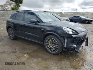 2021 Porsche Cayenne E-Hybrid with VIN WP1AE2AYXMDA24972, listed as a Copart auction lot 48999285 with 62,616 mi miles and Salvage title. Bid and sale history available at DreamBid. Image 4.