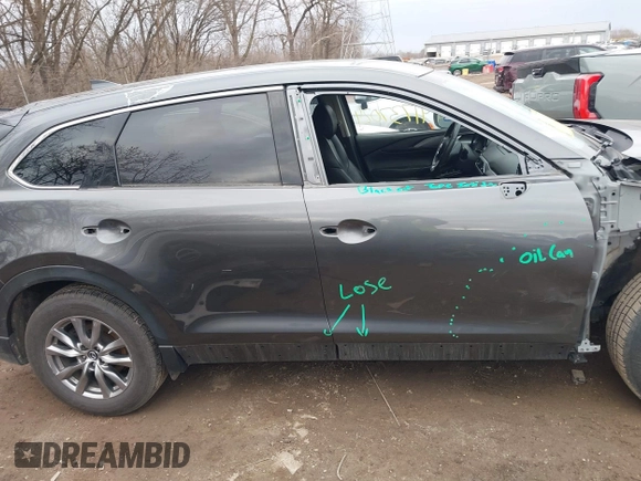 2018 Mazda CX-9 Touring with VIN JM3TCBCY3J0212479, listed as a IAAI auction lot 41737024 with 128,552 mi miles and . Bid and sale history available at DreamBid. Image 13.