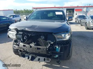 2014 Dodge Durango SXT with VIN 1C4RDHAGXEC345032, listed as a IAAI auction lot 37126149 with 118,001 mi miles. Bid and sale history available at carsss.com. Image 6.