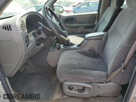 2004 Chevrolet TrailBlazer LS with VIN 1GNDT13SX42330807, listed as a Copart auction lot 55117785 with 178,580 mi miles and Salvage Title. Bid and sale history available at DreamBid. Image 7.