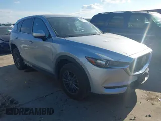 2020 Mazda CX-5 Touring with VIN JM3KFACMXL1786200, listed as a IAAI auction lot 41506139 with 121,944 mi miles. Bid and sale history available at carsss.com. Image 1.