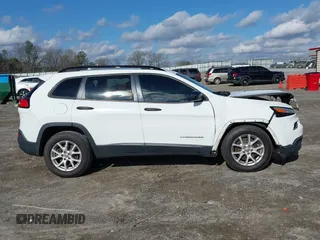 2016 Jeep Cherokee Sport with VIN 1C4PJLAS5GW207990, listed as a IAAI auction lot 41230521 with 253,524 mi miles and . Bid and sale history available at DreamBid. Image 13.
