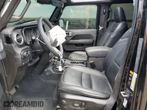 2024 Jeep Wrangler Sahara with VIN 1C4RJXP60RW116607, listed as a Copart auction lot 54562695 with 62,352 mi miles and Salvage title. Bid and sale history available at DreamBid. Image 7.
