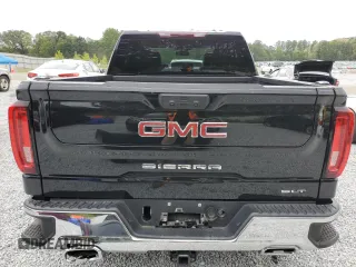 2023 GMC Sierra 1500 SLT z VIN 3GTUUDE87PG106169, wystawiony jako Copart lot #71252284 z przebiegiem 29 136 mil mil oraz Szkoda całkowita • Salvage title. Historia ofert i sprzedaży dostępna na DreamBid. Obrazek 6.
