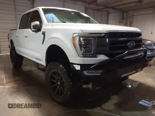 2021 Ford F-150 XL with VIN 1FTFW1E83MKE64200, listed as a IAAI auction lot 41322058 with 28,534 mi miles. Bid and sale history available at carsss.com. Image 1.