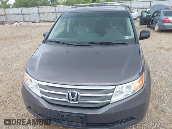 2012 Honda Odyssey EX-L with VIN 5FNRL5H60CB054277, listed as a IAAI auction lot 42459861 with 205,722 mi miles and . Bid and sale history available at DreamBid. Image 12.