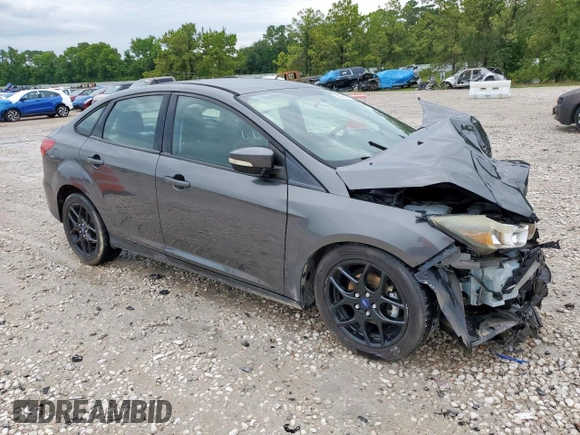 2016 Ford Focus SE with VIN 1FADP3F24GL407339, listed as a Copart auction lot 60744875 with 126,073 mi miles and Salvage title. Bid and sale history available at DreamBid. Image 4.