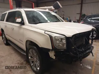 2015 GMC Yukon XL Denali with VIN 1GKS2JKJ1FR635901, listed as a IAAI auction lot 41805739 with 120,998 mi miles and . Bid and sale history available at carsss.com. Image 1.