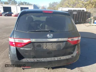 2011 Honda Odyssey EX-L with VIN 5FNRL5H61BB059275, listed as a IAAI auction lot 41293690 with 105,511 mi miles and . Bid and sale history available at carsss.com. Image 16.