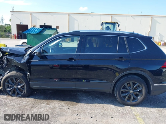 2024 Volkswagen Tiguan SE with VIN 3VVNB7AXXRM199400, listed as a IAAI auction lot 42216941 with 11,581 mi miles and . Bid and sale history available at DreamBid. Image 14.