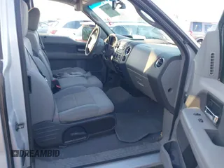 2006 Ford F-150 XLT with VIN 1FTPX14V06NB74894, listed as a IAAI auction lot 41848879 with 266,155 mi miles. Bid and sale history available at carsss.com. Image 5.