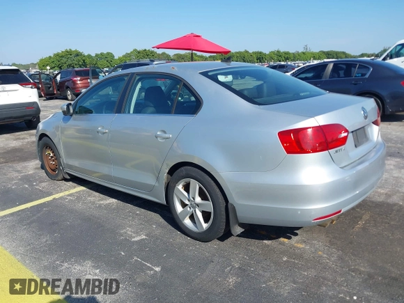 2013 Volkswagen Jetta TDI w/Premium with VIN 3VWLL7AJ0DM385077, listed as a IAAI auction lot 42322406 with 63,428 mi miles and . Bid and sale history available at DreamBid. Image 3.