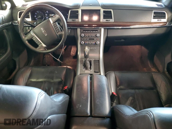 2012 Lincoln MKS с VIN 1LNHL9ER6CG802551, выставлен на аукционе Copart как лот 88782585 с пробегом Не указан миль и Списание • Salvage title. История ставок и продаж доступна на DreamBid. Изображение 8.