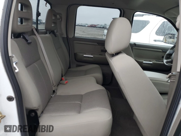 2006 Mitsubishi Raider z VIN 1Z7HT38K16S538273, wystawiony jako Copart lot #79407094 z przebiegiem 67 758 mil mil oraz Szkoda całkowita • Salvage title. Historia ofert i sprzedaży dostępna na DreamBid. Obrazek 10.
