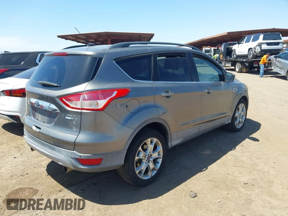 2013 Ford Escape SEL with VIN 1FMCU9H92DUB31689, listed as a IAAI auction lot 42022387 with 74,343 mi miles. Bid and sale history available at carsss.com. Image 4.