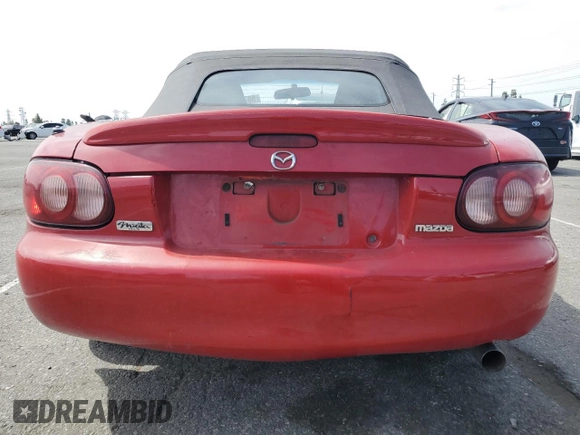 2001 Mazda MX-5 Miata with VIN JM1NB353610216294, listed as a Copart auction lot 56714505 with Not provided miles and Salvage title. Bid and sale history available at DreamBid. Image 6.