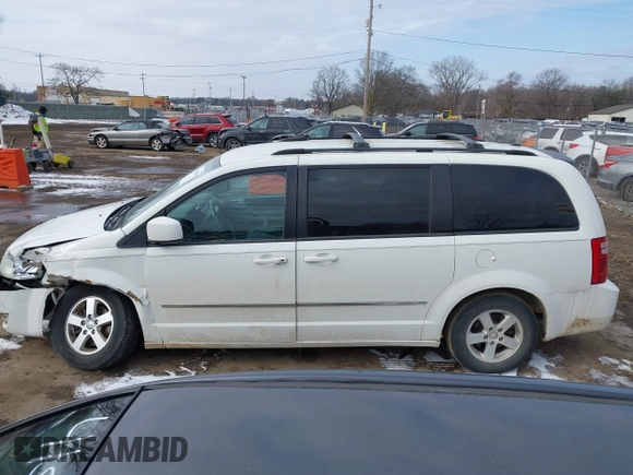 2010 Dodge Grand Caravan SXT with VIN 2D4RN5D18AR218903, listed as a IAAI auction lot 41560484 with Not Provided miles and . Bid and sale history available at DreamBid. Image 14.