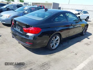 2014 BMW 4 Series 428i xDrive with VIN WBA3N9C53EK244907, listed as a IAAI auction lot 42380025 with 71,431 mi miles and . Bid and sale history available at DreamBid. Image 4.
