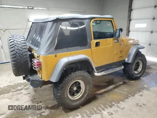 2003 Jeep Wrangler Rubicon with VIN 1J4FA69S23P322353, listed as a Copart auction lot 43915745 with 117,769 mi miles and Salvage title. Bid and sale history available at DreamBid. Image 3.